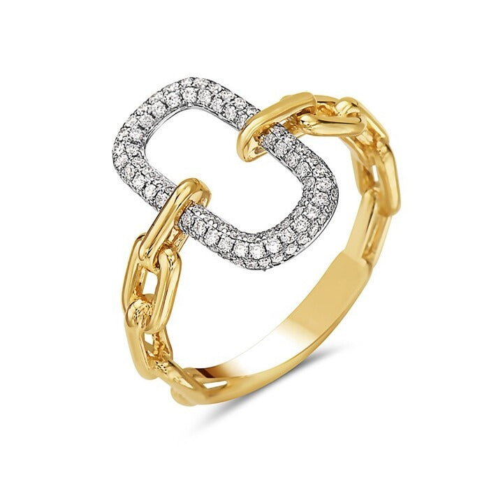 Gold and silver interlocking ring on a white background