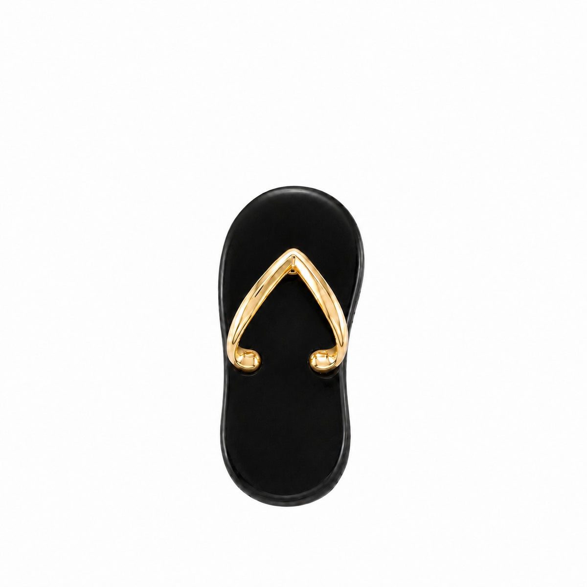 Black sandal with gold toe ring on a white background