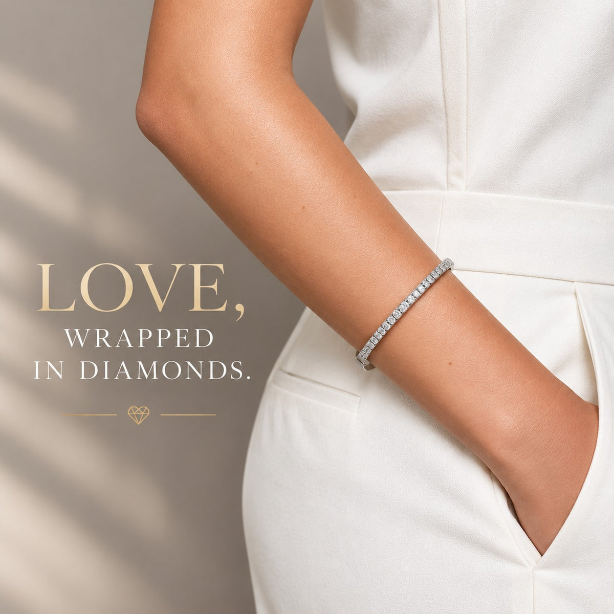 14K white gold and titanium bangle bracelet with sparkling diamond accents and a sleek, elegant design.