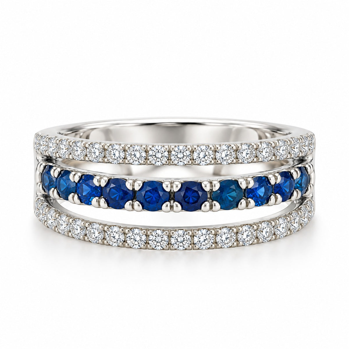 14K white gold open band ring featuring a vivid blue sapphire center row framed by two sparkling diamond rows.