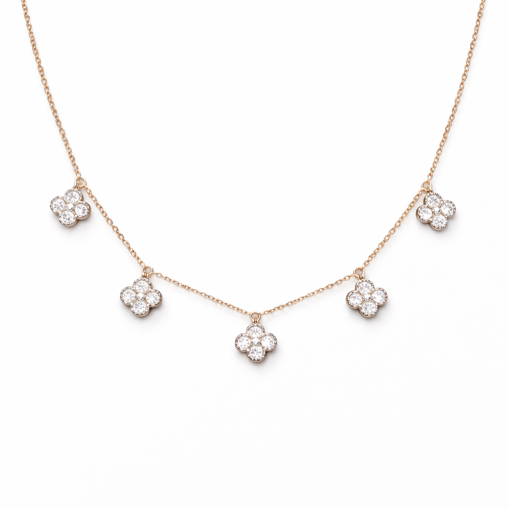 Rose gold necklace with diamond pendants on a white background