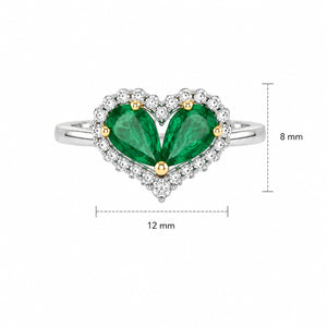 Heart-shaped ring with green pear-cut stones, white halo accents, and a polished white metal band.