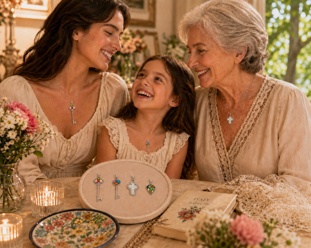 Three generations of women sitting together, smiling and looking at jewelry on a table.