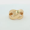 14K yellow gold interlocking knot ring with a high-polish finish.