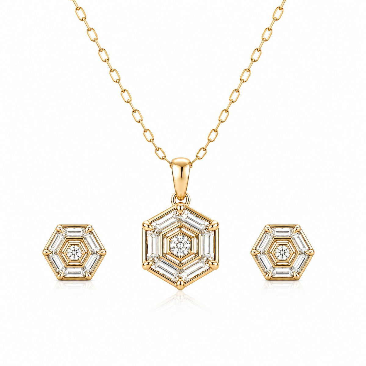 Gold hexagonal necklace with matching earrings on a white background