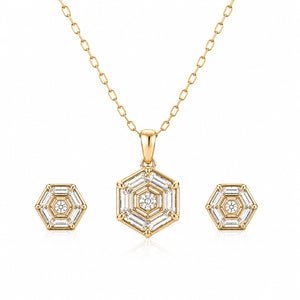 Gold hexagonal necklace with matching earrings on a white background