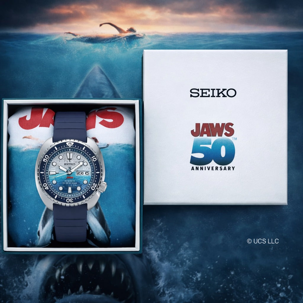 Seiko watch in a box with Jaws 50th anniversary design on a blue background